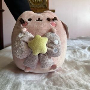 Limited release Claire’s Pusheen with bow and star